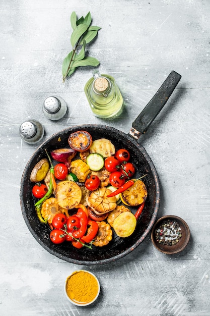 Assortment of grilled vegetables with spices and herbs