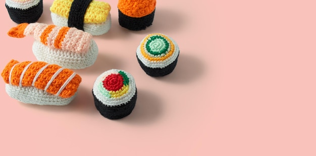 Assortment of maki sushi rolls and nigiri handmade in crochet and colored wool Sushi set amigurumi