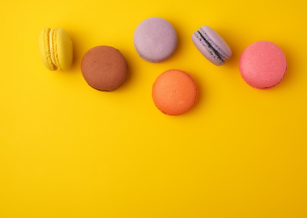 Assortment of multi-colored baked round macarons