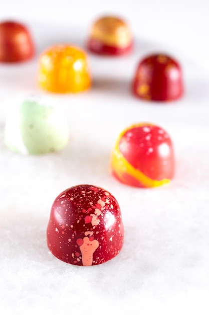 Assortment of painted chocolate pralines Handcrafted bonbonsDelicious dessert