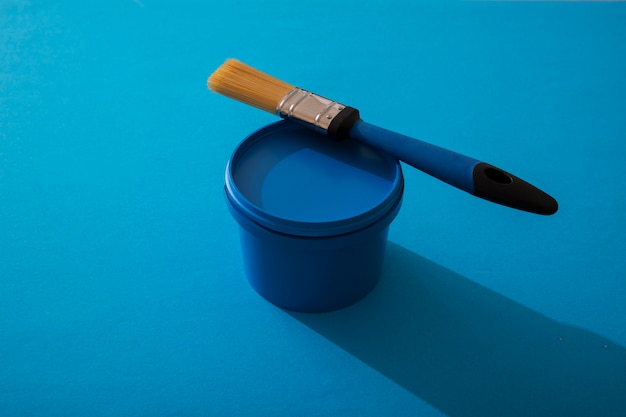 Assortment of painting items with blue paint