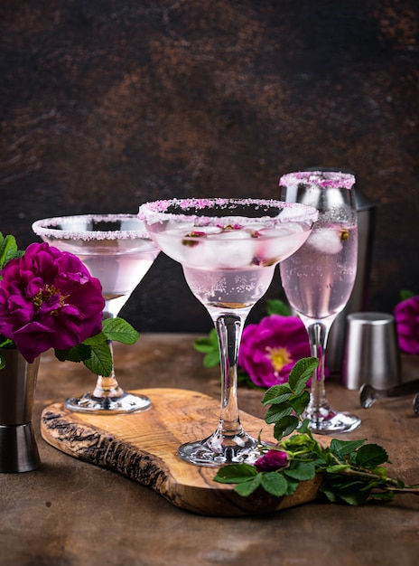 Assortment of pink cocktails with rose syrup.