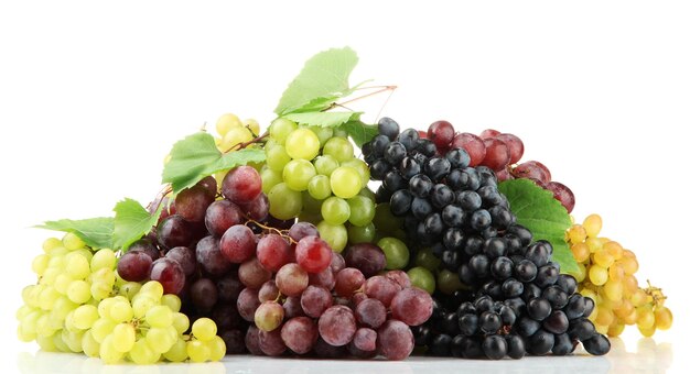 Assortment of ripe sweet grapes isolated on white