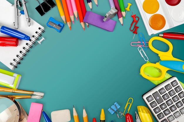 Assortment  of School supplies on background