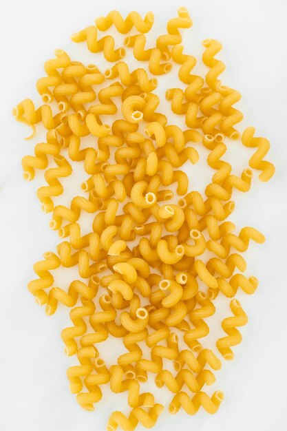 Assortment of shapes of pasta on white background isolated