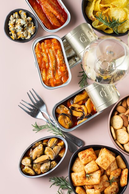 Photo assortment of tinned fish canned food ready for date night