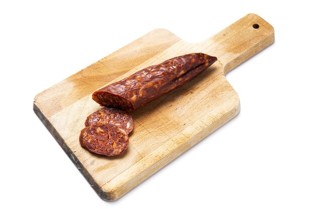 Assortment of typical Spanish homemade sausages with a colorful background. Iberian Chorizo and Salchichon