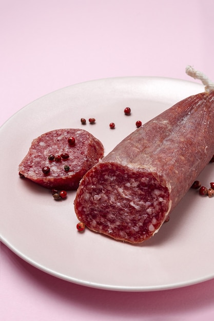 Assortment of typical Spanish homemade sausages with a colorful background. Iberian Chorizo and Salchichon