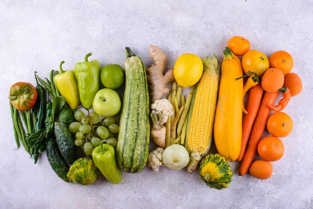 Assortment of yellow and red vegetables and fruits