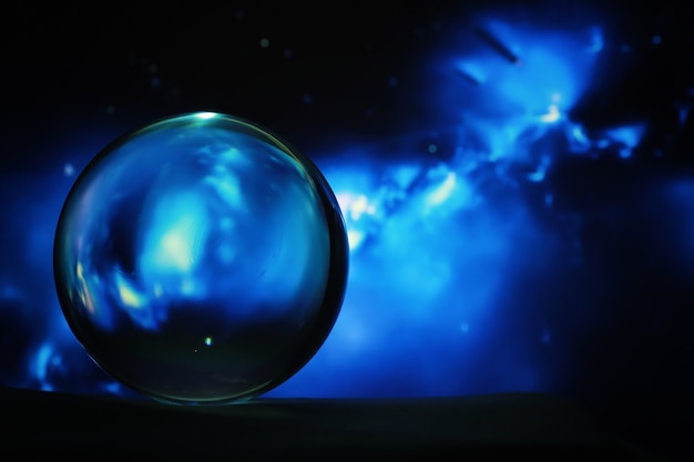 Astrological background. Crystal ball with predictions. Horoscope of the stars. Fortune telling and determination of fate. Soothsayer with a crystal ball.