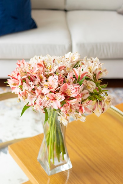 Astromeliads flower arrangement in a nice living room