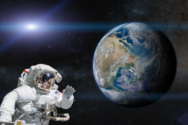 Astronaut in outer space on of the Earth