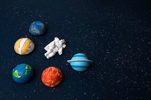 Photo astronaut and planets on space background