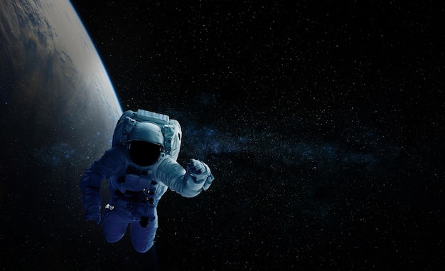 Astronaut and space background Elements of this image furnished by NASA