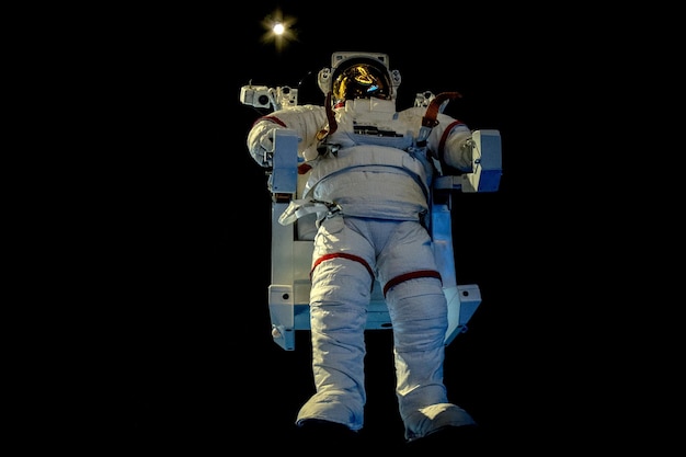 Astronaut Space Suit isolated while floating on black