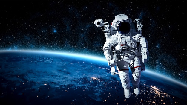 Astronaut spaceman do spacewalk while working for space station