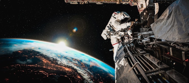 Astronaut spaceman do spacewalk while working for space station