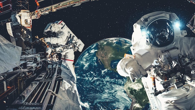 Astronaut spaceman do spacewalk while working for spaceflight mission