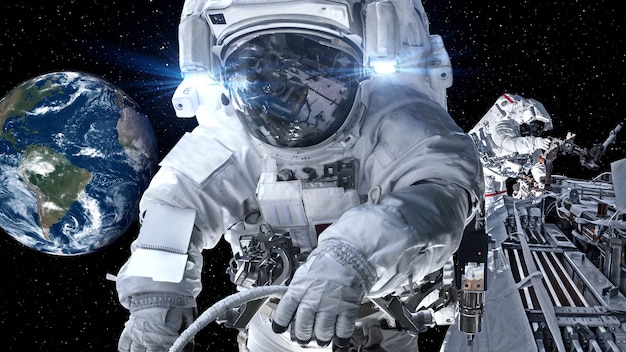 Astronaut spaceman do spacewalk while working for spaceflight mission