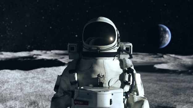 An astronaut stands on the surface of the moon among craters against the backdrop of the planet earth.