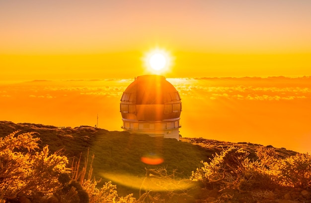 Astronomical Observatory of the Caldera de Taburiente in a beautiful orange sunset