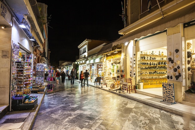 ATHENS, GREECE - OCTOBER 20, 2016: Pedestrian souvenir market street in Plaka region. Plaka is the old historical neighborhood of Athens in Greece.