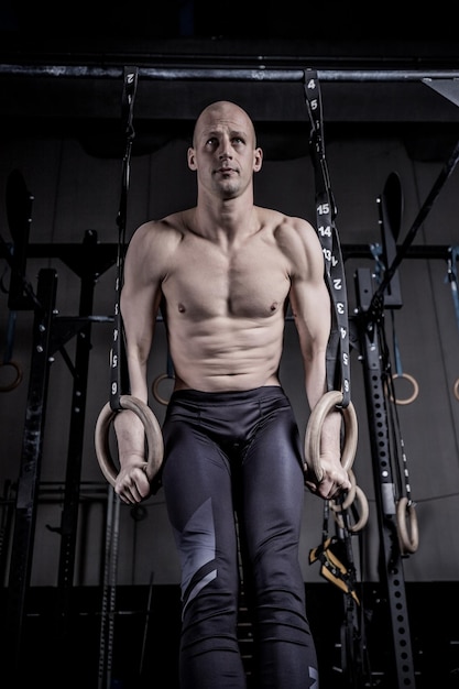 Athlete Doing Push Up With Rings at Gym