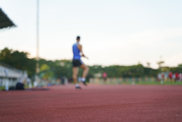 Athlete running along a horizontal track