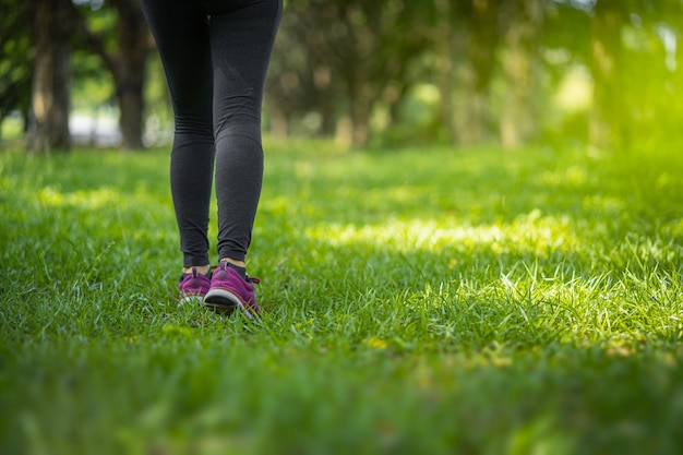 Athlete running sport feet on trail healthy lifestyle fitness