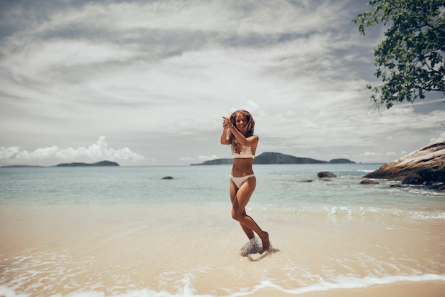 athletic girl fun on the beach