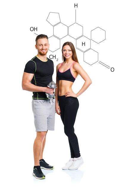 Athletic man and woman with dumbbells on the white with the chemical formula on background concept of healthy life