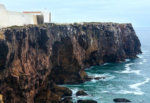 Atlantic ocean coast and Sagres castle on cape (Algarve, southern Portugal).