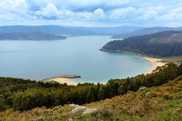 Atlantic Ocean landscape and Estaca de Bares peninsula coast. Summer overcast view. Province of A Coruna, Galicia, Spain.