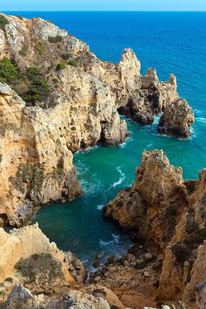 Atlantic ocean summer rocky coastline view Ponta da Piedade Lagos Algarve Portugal