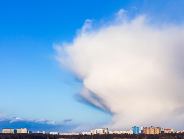 Atmospheric front over city in spring