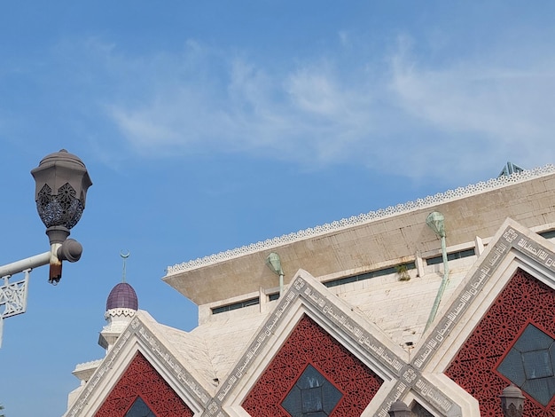 Attin grand mosque under the sunlight and a blue sky in Jakarta Indonesia