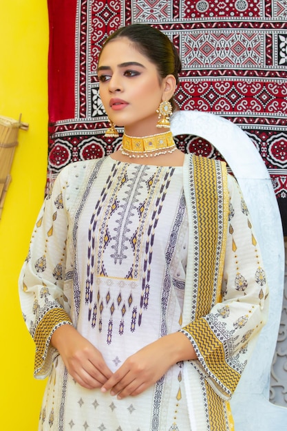 Attractive and Beautiful Young Girl Portrait in White Traditional Dress