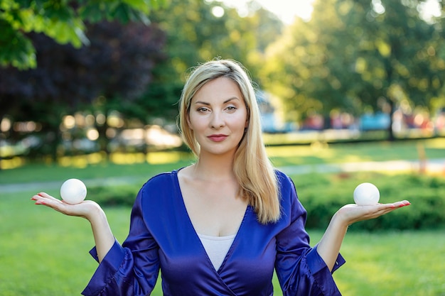 Attractive Blonde is Enjoying in Meditation in Public Park