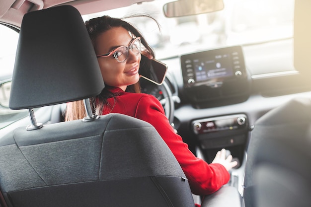 Attractive brunette in the car Lady driving