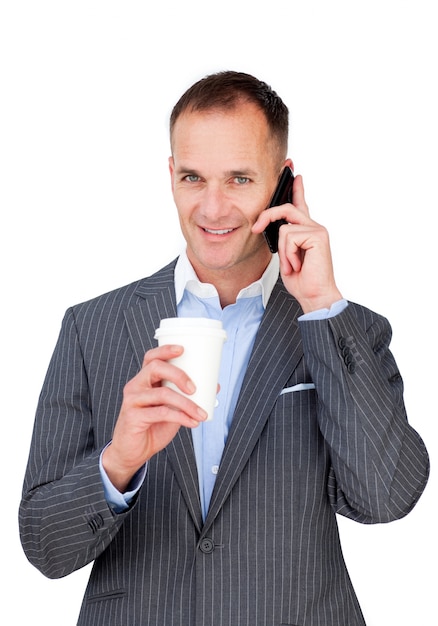 Attractive businessman talking on phone 