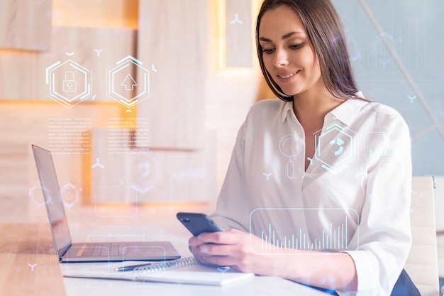 Attractive businesswoman in white shirt using smart phone to optimize development by implying new technologies in business process Hi tech hologram over modern office background