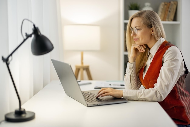 Attractive lady freelancer at home