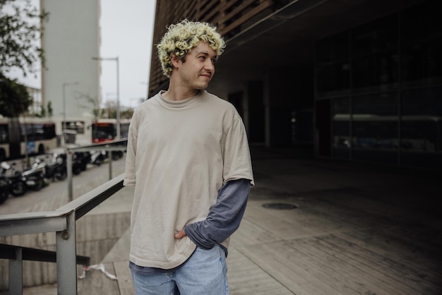 Attractive man in the city looking away