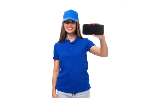 Attractive pretty young caucasian brunette advertiser woman dressed in clean blue polo tshirt and