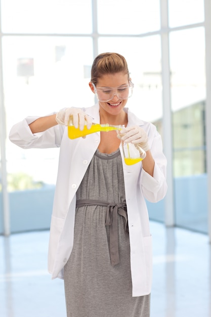 Attractive scientist examining a testtube