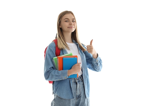 Attractive student girl isolated on white background