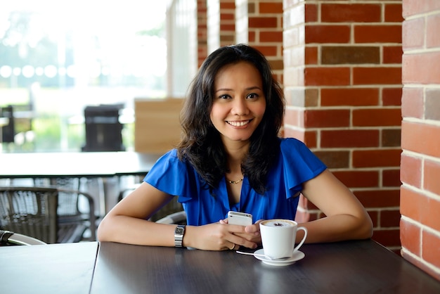 Attractive woman in cafe