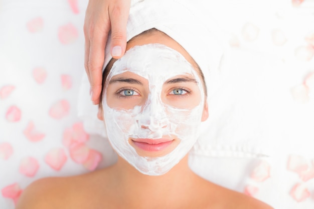 Attractive woman receiving treatment at spa center