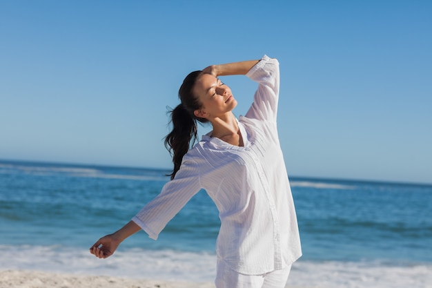 Attractive woman relaxing the sun