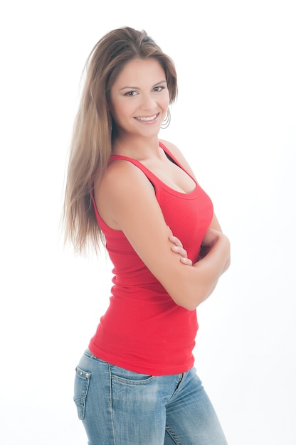 attractive woman in tank top with jeans